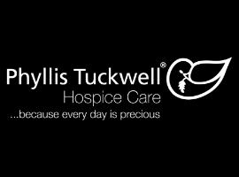 Phyllis Tuckwell's logo in all white